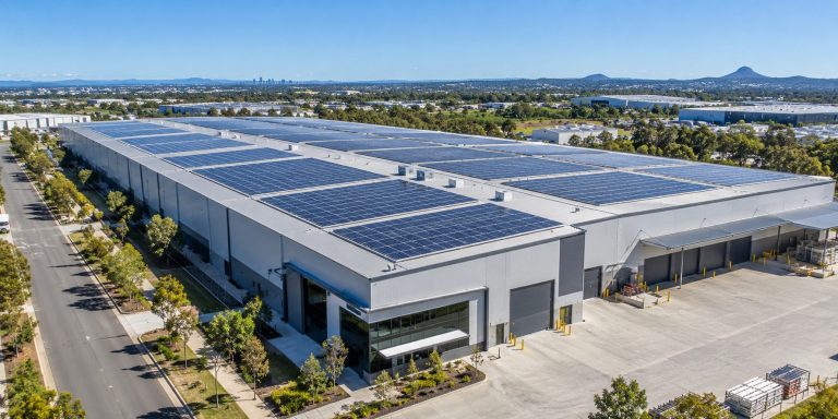 Aerial view of solar panels on a suburban roof